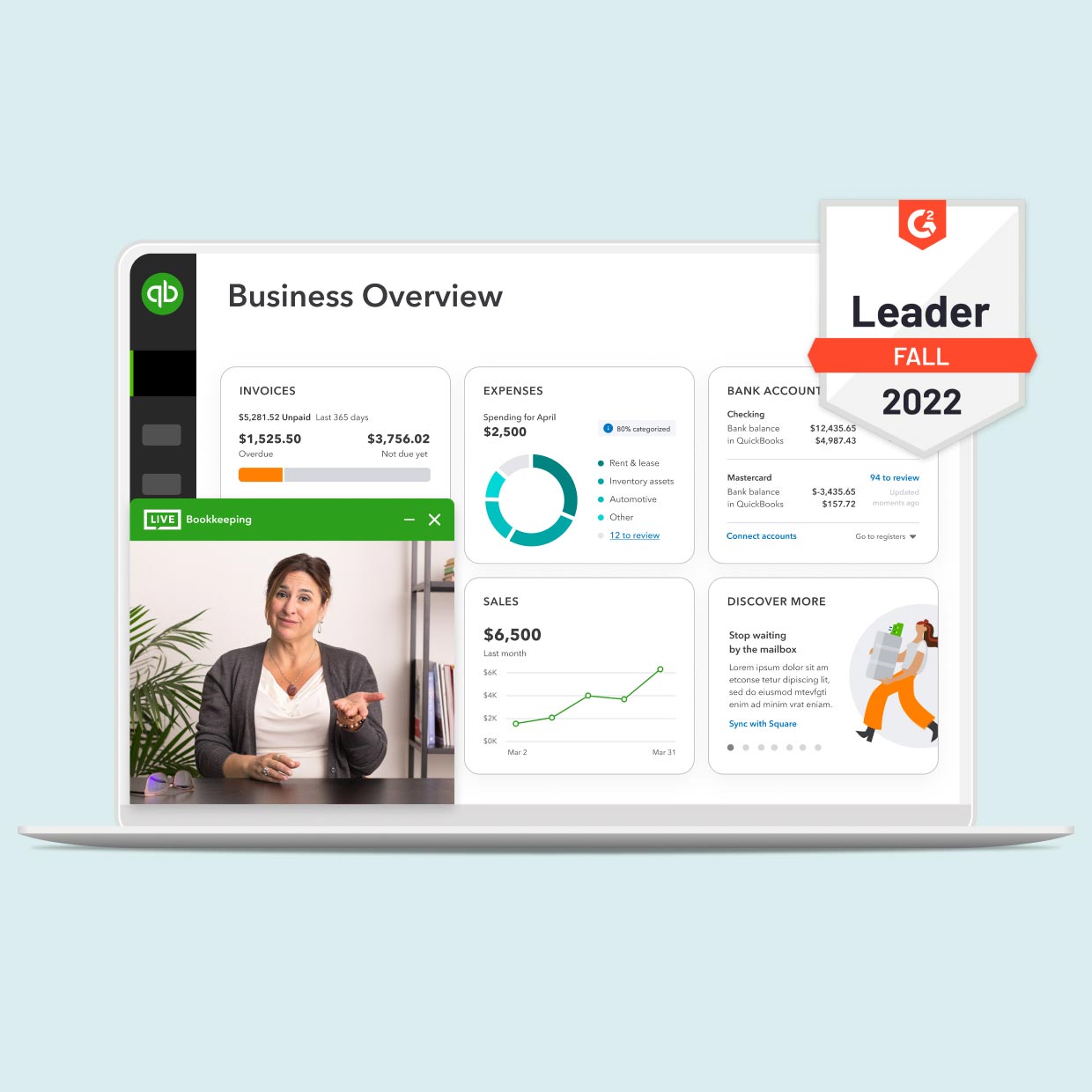 A QuickBooks customer dashboard with a video chat box and a Fall 2022 G2 Leader Award badge on a laptop screen. 