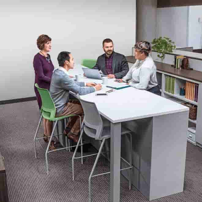 Group of QuickBooks accountants having a discussion together in a meeting
