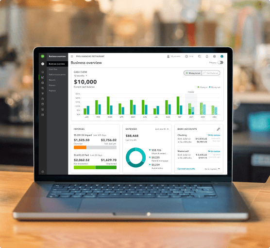 A laptop displaying the QuickBooks product dashboard